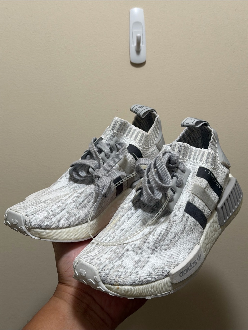 Adidas women’s NMD R1 Primeknit Shoes in Light Gray/White